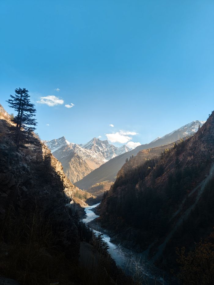 about-us-02 Breathtaking mountain landscape with a river in Himachal Pradesh, India.
