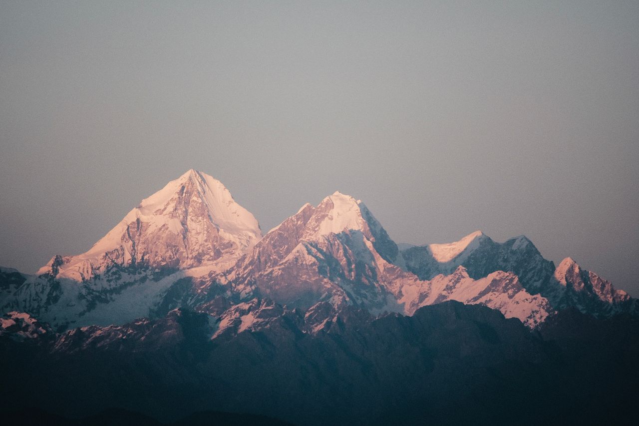 heros-img A breathtaking view of the Himalayan mountains bathed in soft sunrise light, revealing snow-capped peaks.